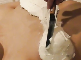 Home made personal shooting: Decorate the boobs of a busty beauty with fresh cream and lick off the cream.